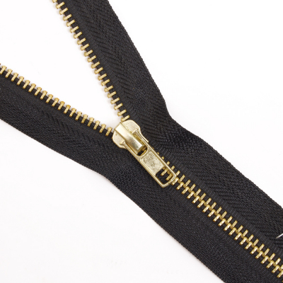 Молния Т5 джинс. авт. MaxZipper. 18 см золото/ 322 черный в интернет-магазине Швейпрофи.рф